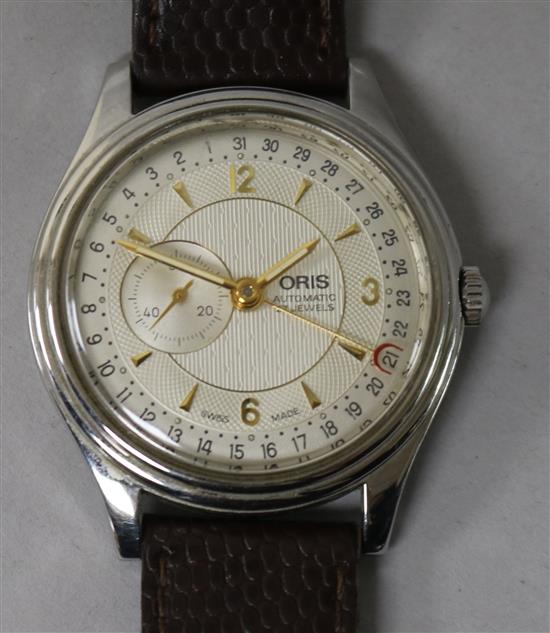 A gentlemans stainless steel Oris calendar automatic wrist watch.